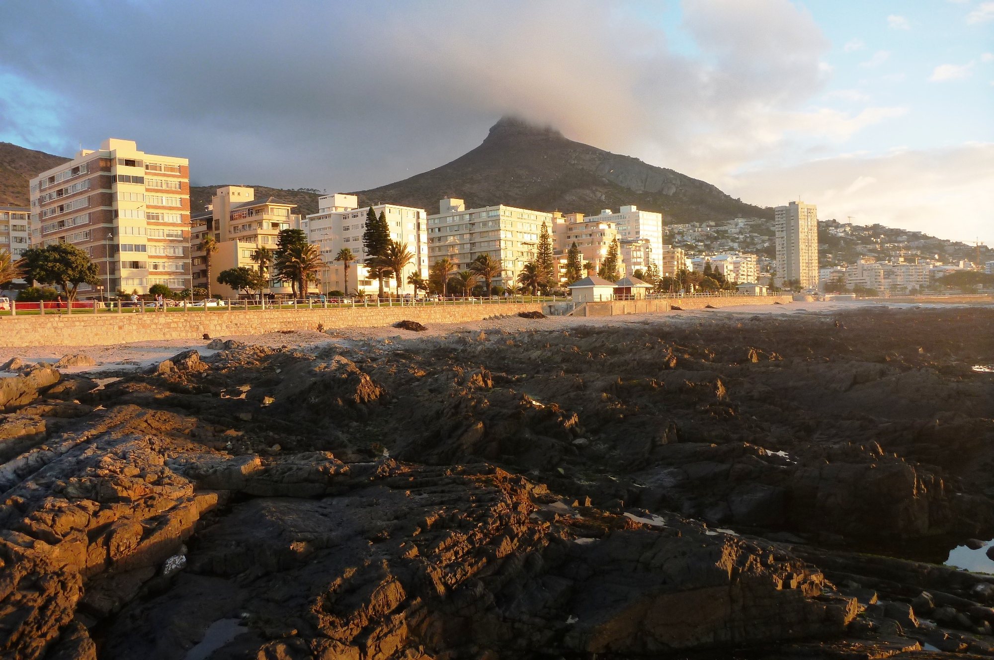 The Sea Point promenade and seaboard below Lion's Head at golden hour